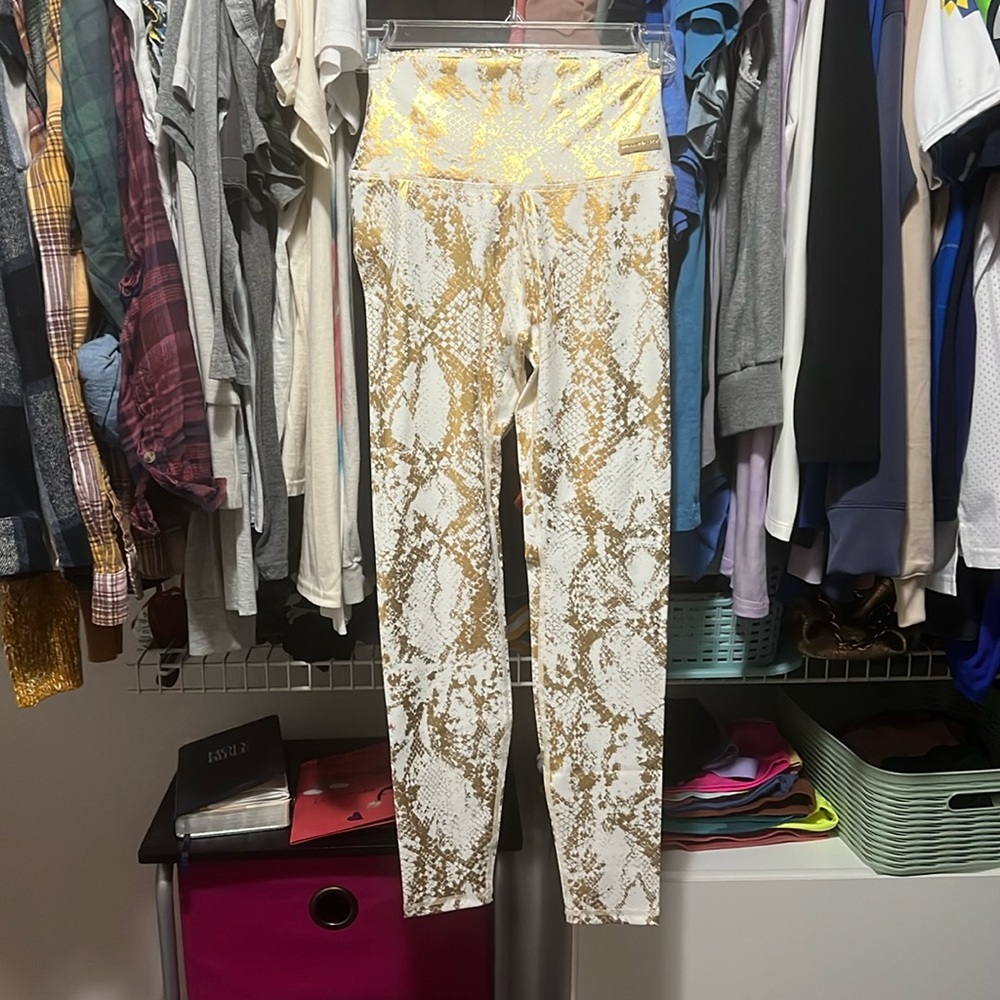 Minibeast leggings, size S, white and gold snake print.